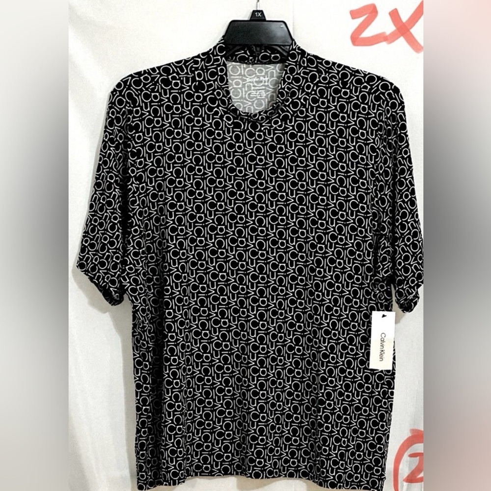 LADIES WHITE TOP WITH CALVIN KLEIN BLACK LETTERING NWT